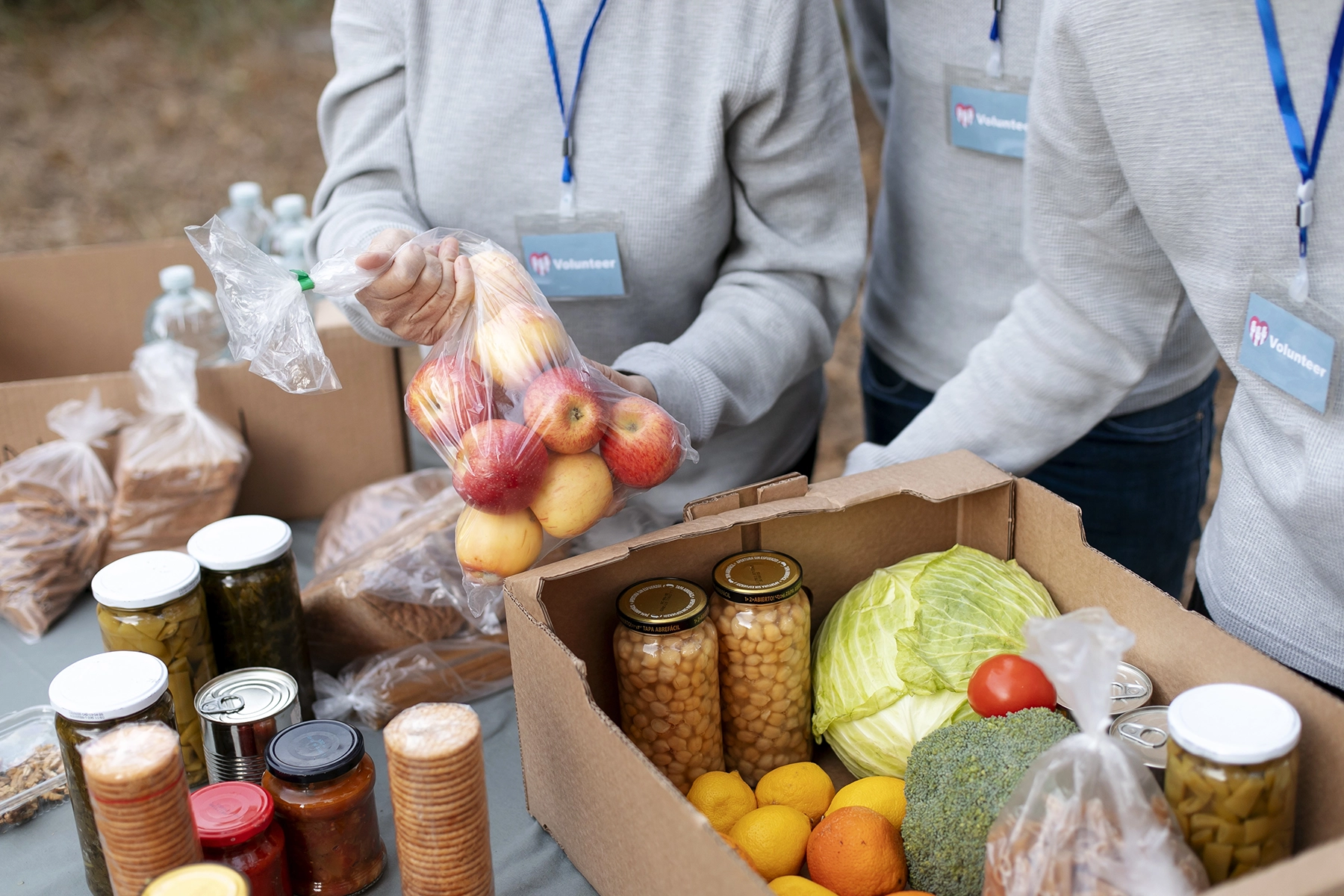 Food pantry volunteers collecting donations